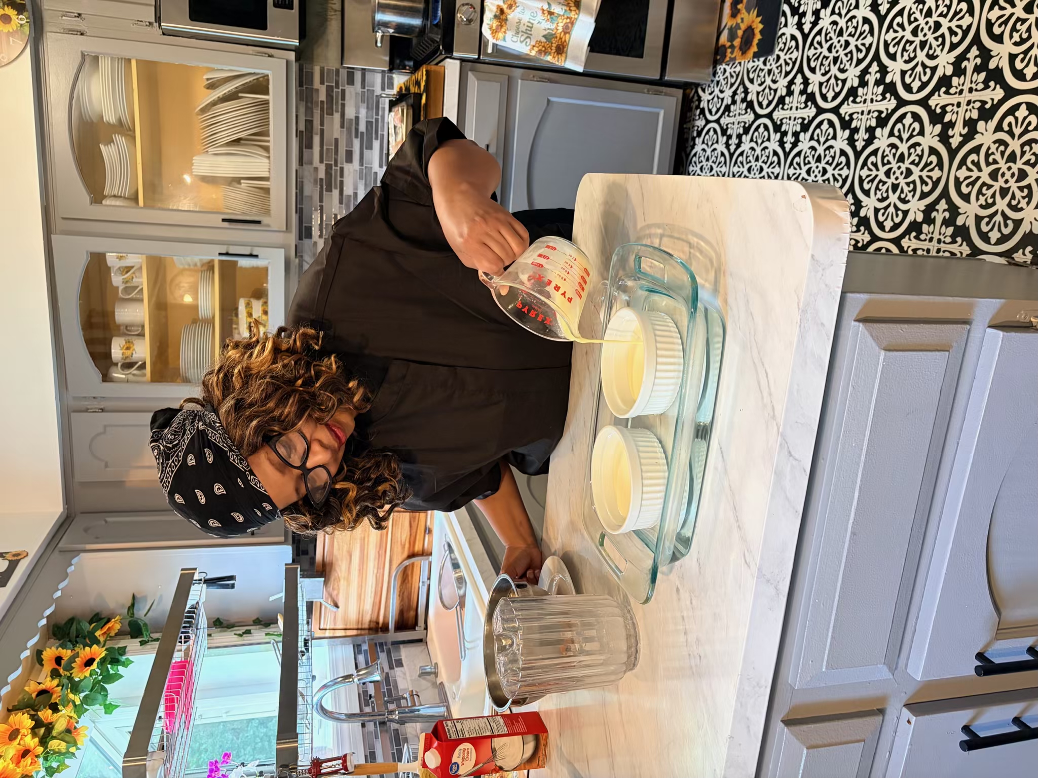 Chef Shorlanda preparing crème brûlée for an intimate dinner for two