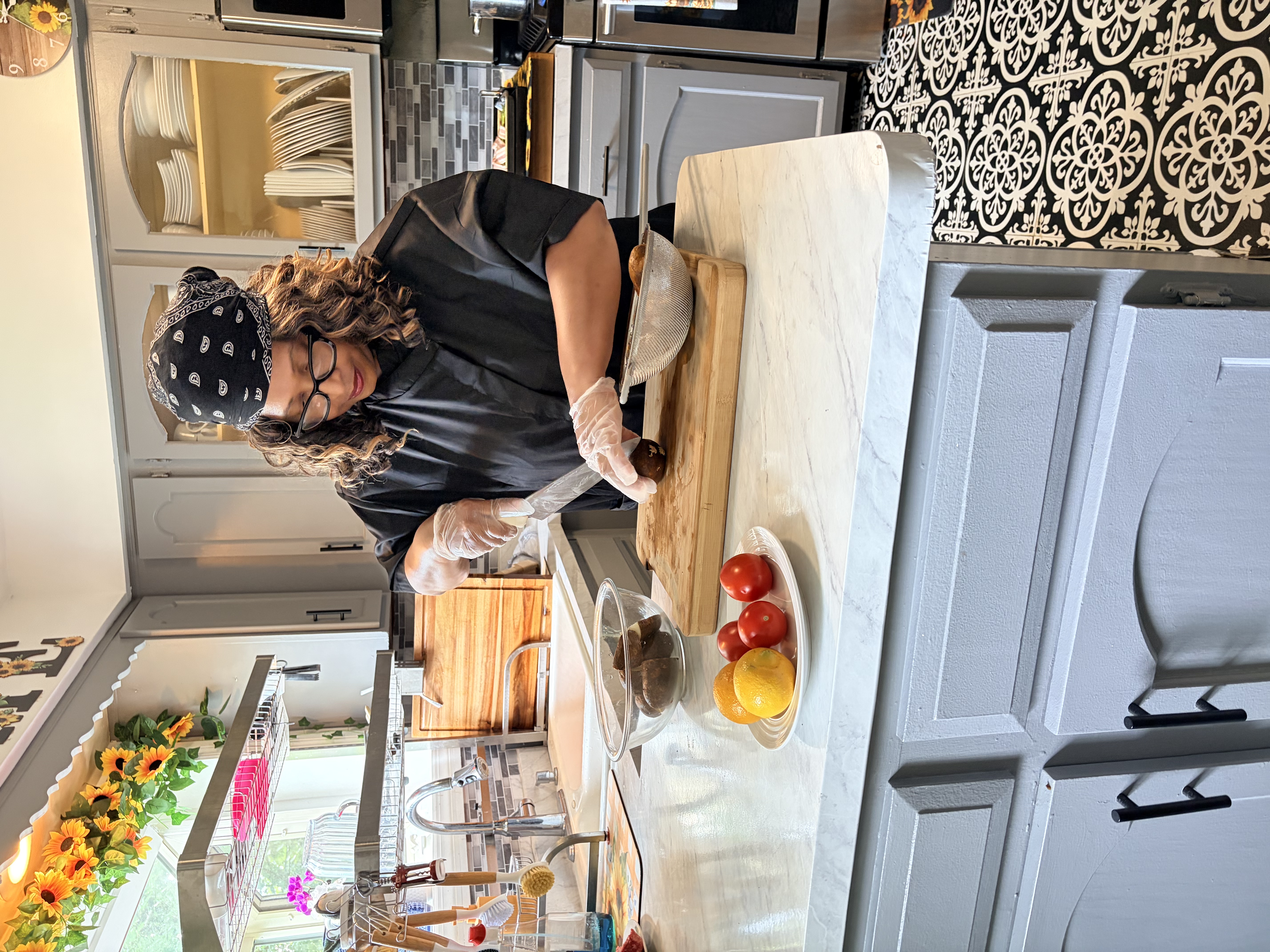 Chef Shorlanda prepping fresh potatoes for an intimate dinner for two